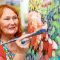 Carole Foster and her designer birds